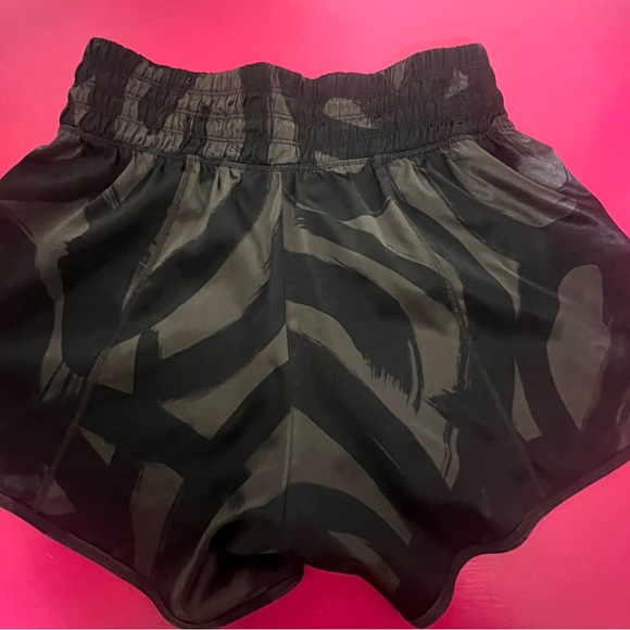 Athleta Extra small tenacity 5inch short—-shiny silky material - Picture 4 of 6